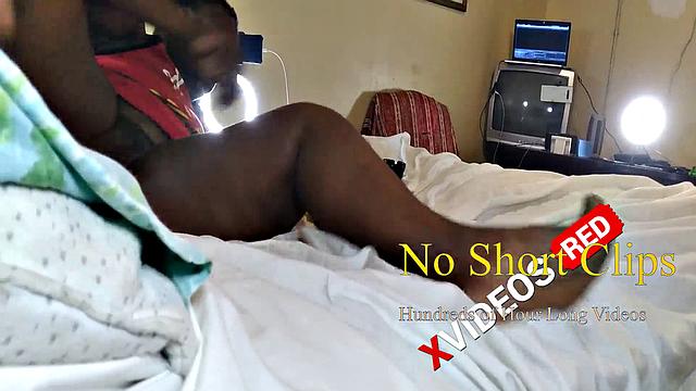 A hot American MILF masturbate in the bedroom with her bald pussy