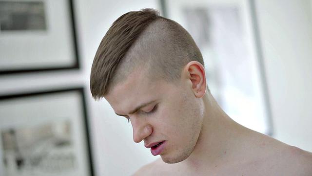 Inked twink solo jerking before cumming on stomach