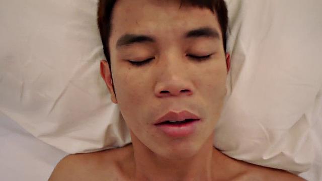 Skinny Asian twink fucked by top DILF at home in closeup