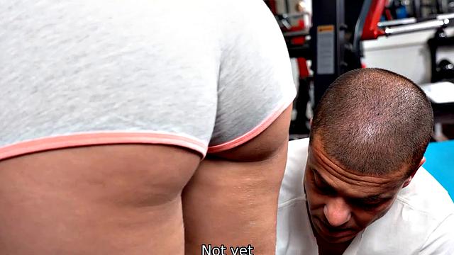 Blonde hottie with glasses gets nailed in a gym reverse cowgirl with a big-titted girl