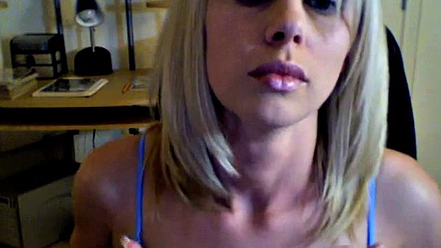 Kylie plays with her pussy in a solo home video