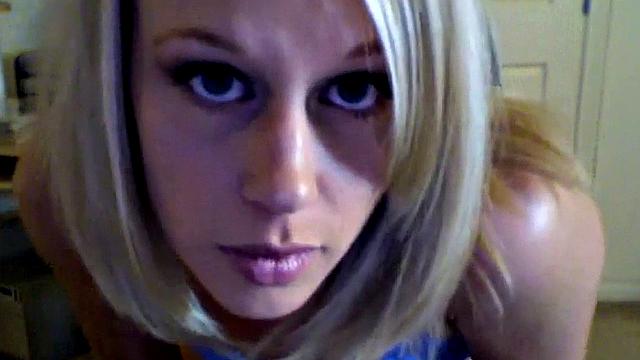 Kylie plays with her pussy in a solo home video