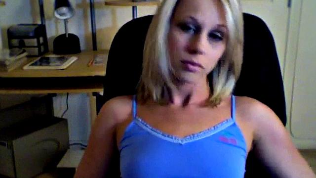 Kylie plays with her pussy in a solo home video