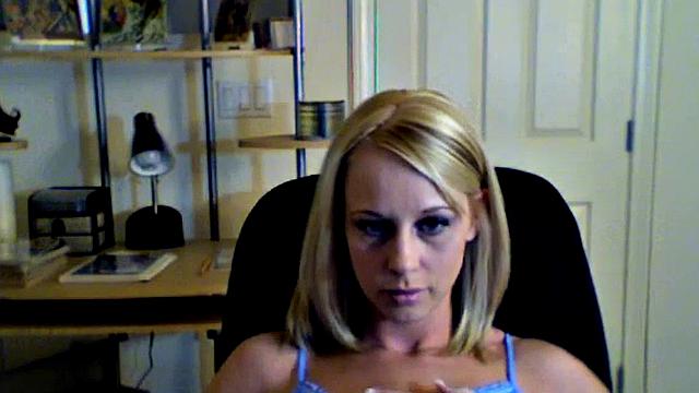 Kylie plays with her pussy in a solo home video