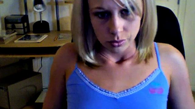 Kylie plays with her pussy in a solo home video