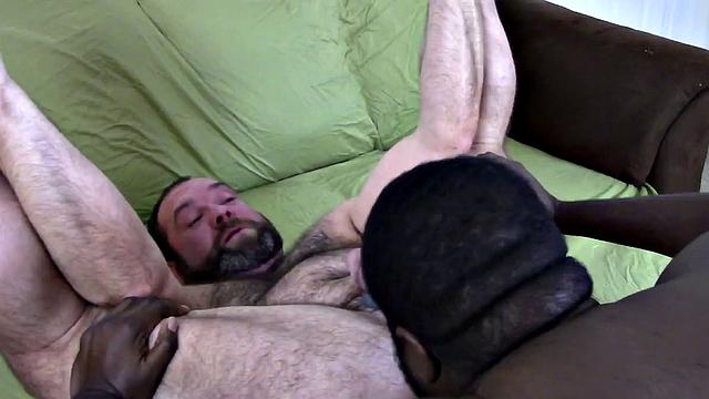 Topher introduces Deont'e Blaxxx to the world of gay porn by opening his tight hairy hole for his friend's big black cock. Deont'e is a sexy smooth chocolate cub with sensitive nips, bull balls, and a dick to be envious of.