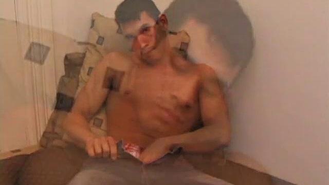 Justin Christopher strokes his cock for the camera
