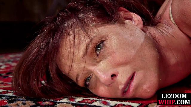 Hardtied cougar gets fisted by domina