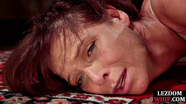 Hardtied cougar gets fisted by domina