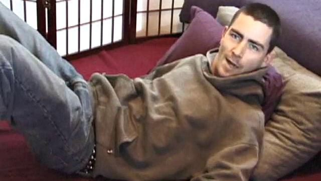 Dan's clothes quickly disappear and he pumps steadily with his left hand, showing off the two stars tattooed on his forearm. Lubrication enhances Dan's serious stroke session.