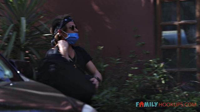 Jennifer White gets "help" from stepson while husband is stuck in China