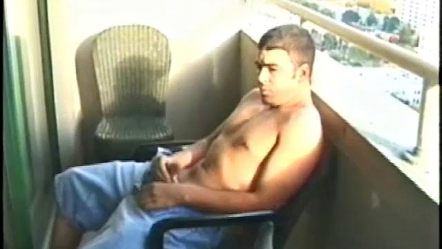 Tony Hammer invites us onto his balcony for an outdoor jerk off session. He leans back on a chair, stretches out his legs and starts stroking his cock. After some hard pounding, Tony abruptly stands and shoots down at us with a splattering load.