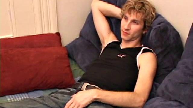 Amateur Jenson McGill rubs his crotch while watching porn, strips off clothes to stroke stiff cock & cum on face