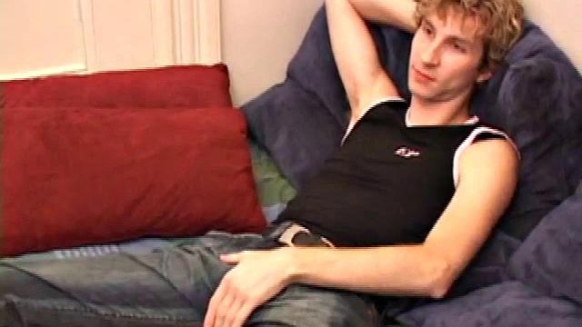 Amateur Jenson McGill rubs his crotch while watching porn, strips off clothes to stroke stiff cock & cum on face