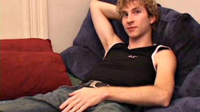 Amateur Jenson McGill rubs his crotch while watching porn, strips off clothes to stroke stiff cock & cum on face