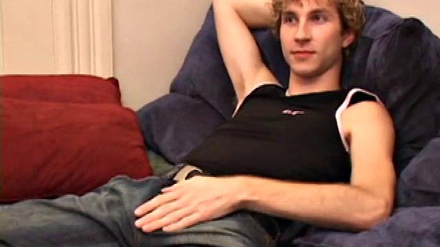 Amateur Jenson McGill rubs his crotch while watching porn, strips off clothes to stroke stiff cock & cum on face