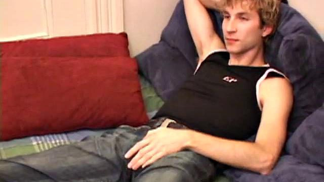 Amateur Jenson McGill rubs his crotch while watching porn, strips off clothes to stroke stiff cock & cum on face
