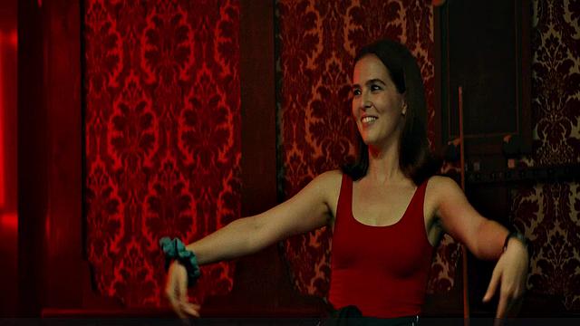 Zoey Deutch gets naughty in the billiards room while showing off her sexy curves in a sexy interracial video