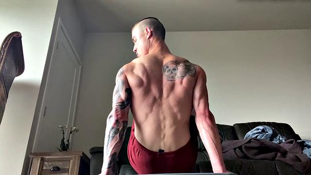 Ripped jock jerks in solo before dildoing ass