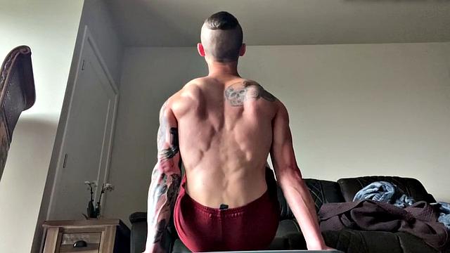 Ripped jock jerks in solo before dildoing ass