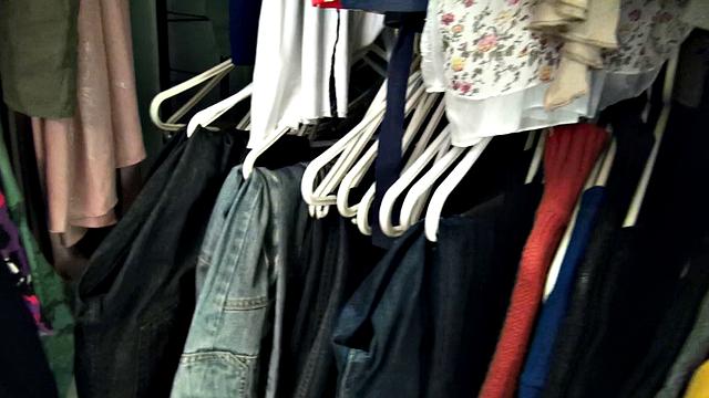 Blonde bombshell in changing room rides dick while giving a handjob