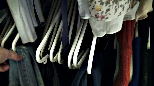 Blonde bombshell in changing room rides dick while giving a handjob