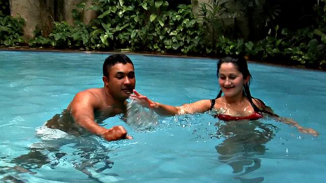 Watch how this tattooed brunette gets her pussy licked and fucked hard in the pool