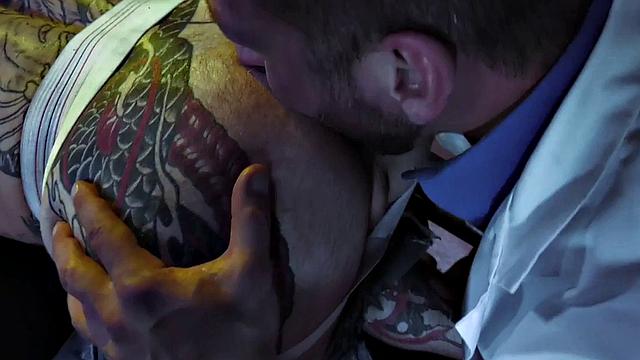 Tattooed stud barebacked by doctor before fisting