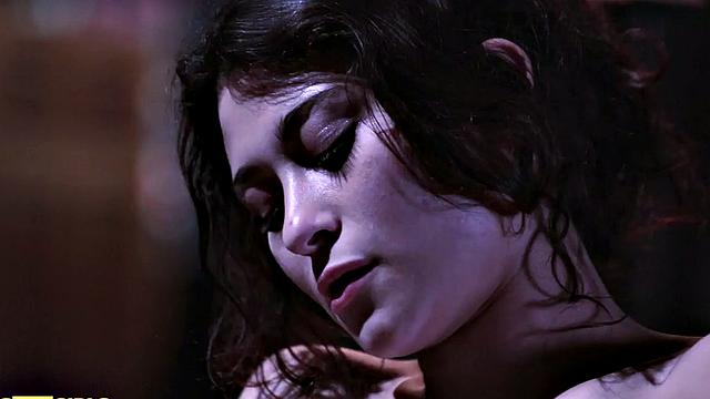 Brunette bombshell pleasures herself in front of mirror in steamy solo session