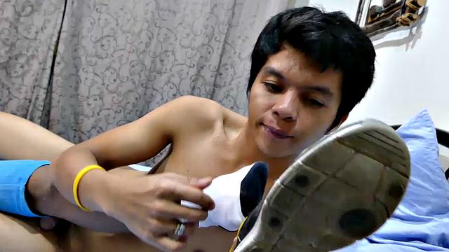 This kinky twinky Asian boy Russel loves having his feet serviced. George is with cute little Russel today for some hot male feet sex. With plenty of boy feet worship and toe sucking, the Asian boys grow increasingly horny.