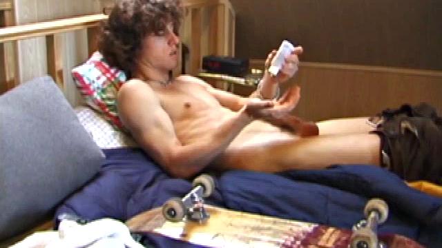 With his skateboard at his side, this young street surfer wastes little time sliding down his pants and pulling out his rock hard cock. With the underwear off, Adam grabs a dildo, raises his legs into the air, and shoves it up his ass.