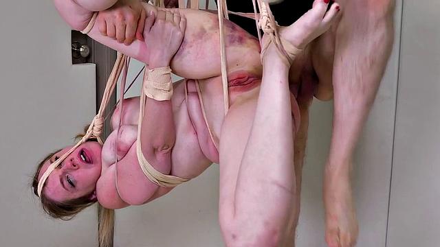 Rope tied babe gets pounded