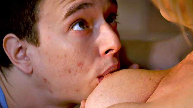 Stunning granny with big tits riding younger lover's cock