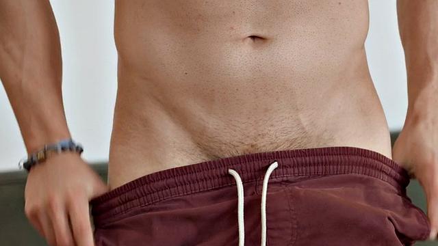 Muscular eager jock solo wanking and licking cum off fingers