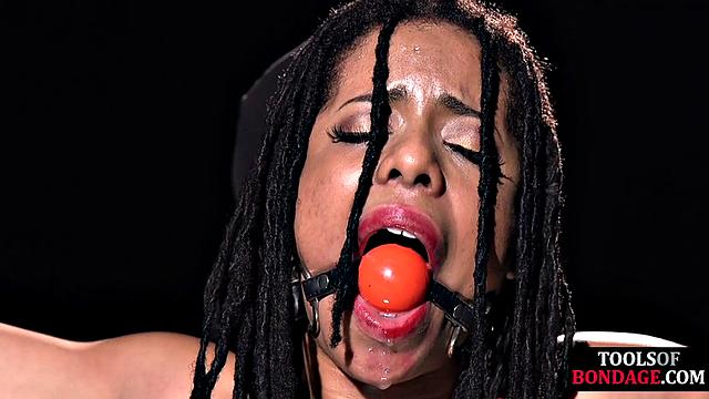 Mouthgagged Ebony anally toyed by maledom