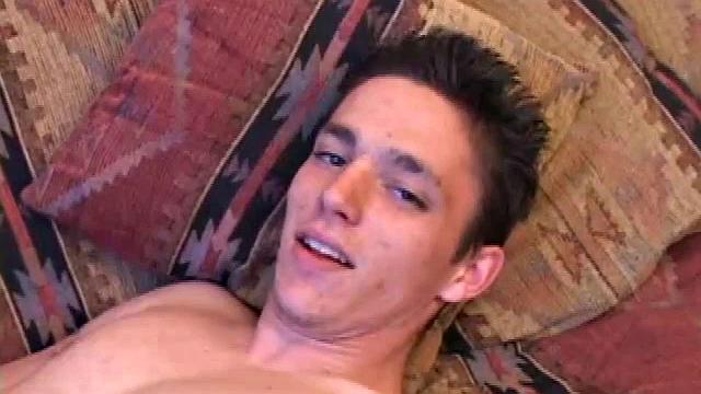 Shawn Cage pulls out his dick and starts to suck on it. He manages to get into positions that allow his cock to reach his mouth. After a hot self-sucking stroke show, Shawn squeezes out a warm load right into his mouth.