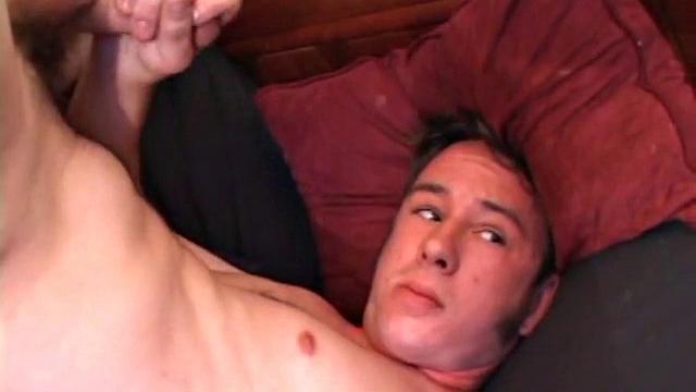 After he pulls his dick out of his pants, Phil works it up nice and stiff. Then he gets busy stroking his hard meat. Finally, the boy blows his load on his face.