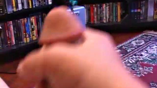 After he pulls his dick out of his pants, Phil works it up nice and stiff. Then he gets busy stroking his hard meat. Finally, the boy blows his load on his face.