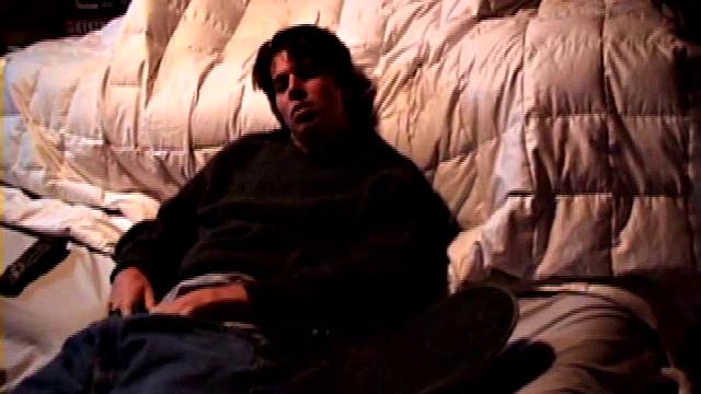 Jayden works his cock with his hand while gyrating hips, lifting legs high for added stimulation and close-up views.