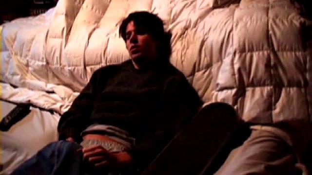 Jayden works his cock with his hand while gyrating hips, lifting legs high for added stimulation and close-up views.