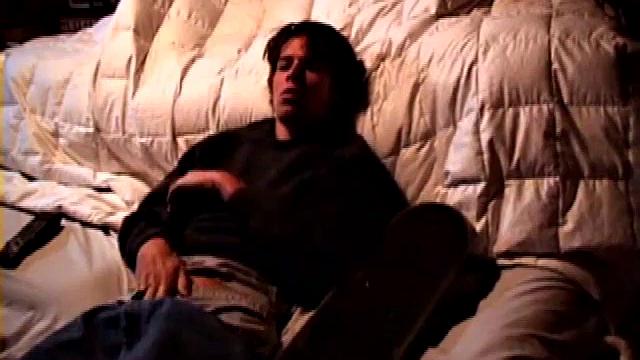 Jayden works his cock with his hand while gyrating hips, lifting legs high for added stimulation and close-up views.