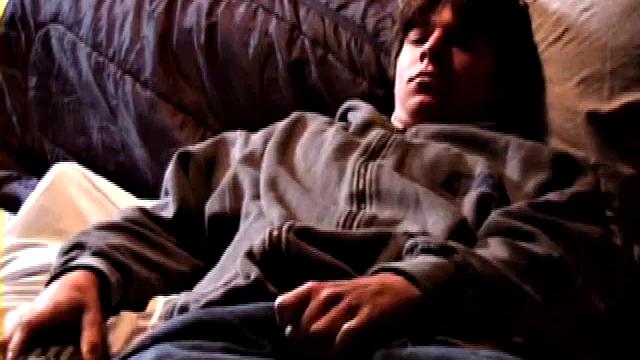 Jayden works his cock with his hand while gyrating hips, lifting legs high for added stimulation and close-up views.