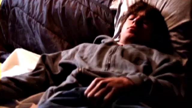 Jayden works his cock with his hand while gyrating hips, lifting legs high for added stimulation and close-up views.