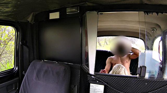 Blonde bombshell with huge tits goes wild on her passenger's hard rod