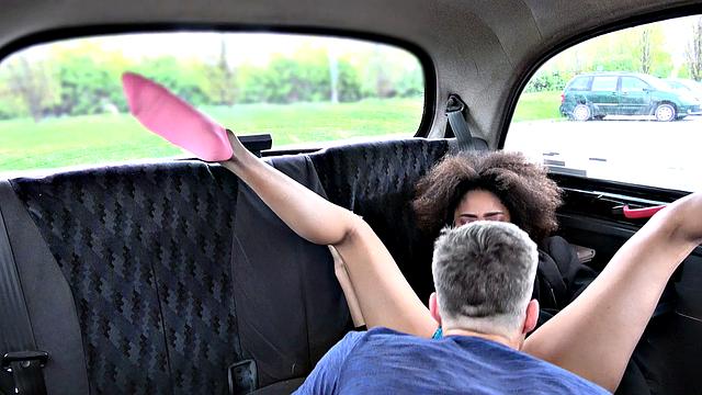 Curly-haired ebony stunner rides a big dick in jeans & car
