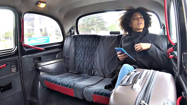 Curly-haired ebony stunner rides a big dick in jeans & car