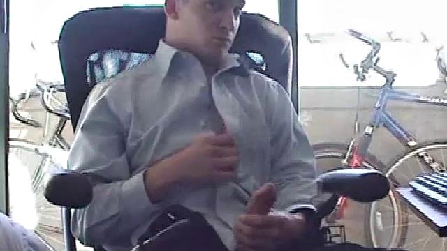 Just home from work, Darrell loads some porn on his computer. He works up a bulge, before exposing his huge cock through the fly. After the shirt comes off, we see an awesome gym build on this straight boy.