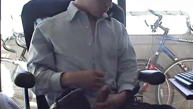 Just home from work, Darrell loads some porn on his computer. He works up a bulge, before exposing his huge cock through the fly. After the shirt comes off, we see an awesome gym build on this straight boy.