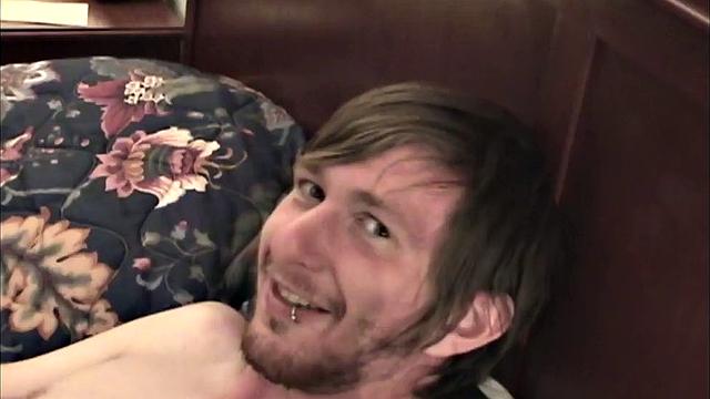 In this homemade video, skinny Eugene is ready on the bed to beat off. By the time he's naked, that big dick is rock hard and ready to play with.