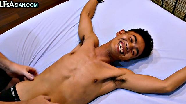 Tickled Asian twink enjoys anal with DILF in bondage